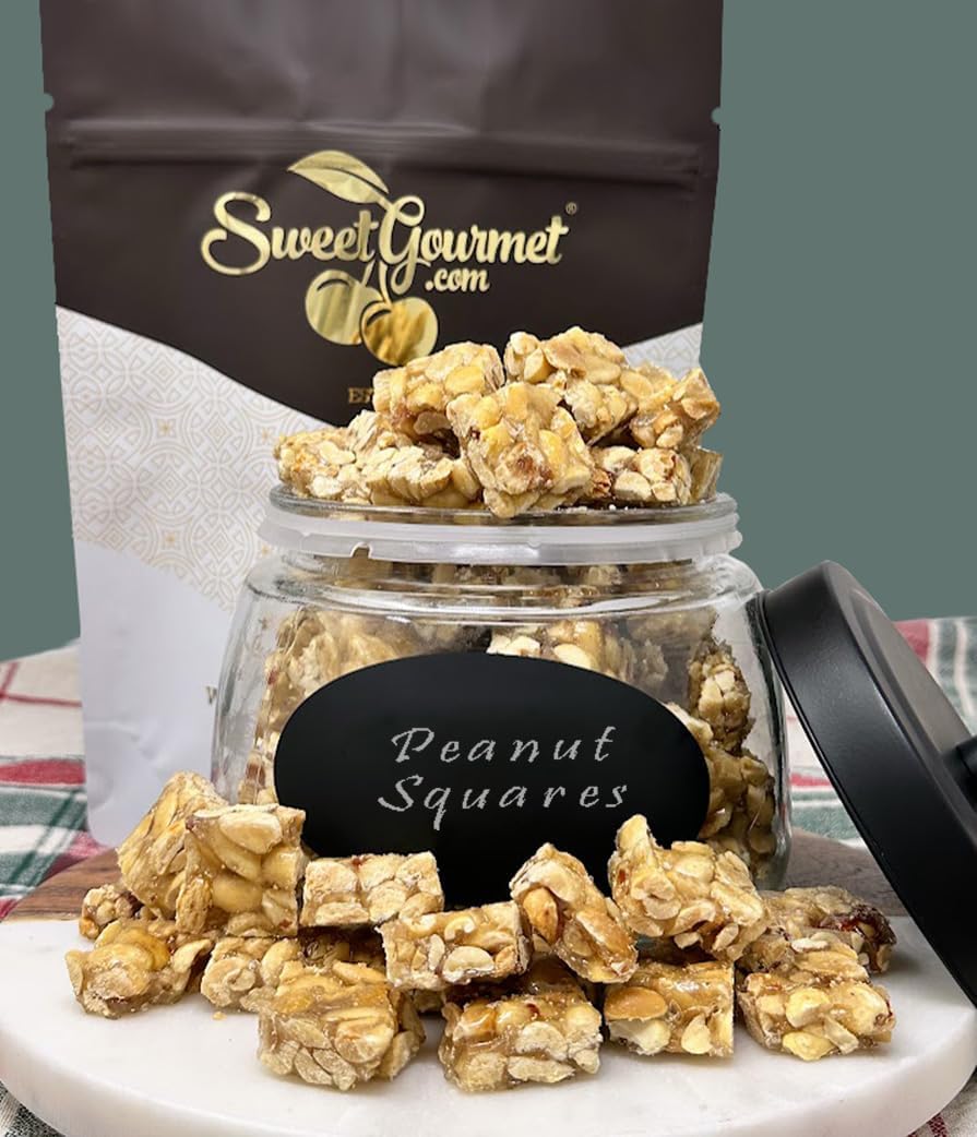 Close up view of gluten free sweet and salty peanut squares on a dessert table.