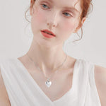 Perspective view of heart memorial keepsake jewelry