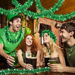 Regteb Saint Patricks Day party decor showing the fifty foot green garland cut and shaped into a DIY front door wreath.