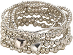 Kysin Chiys gold plated bracelet set arranged side by side.