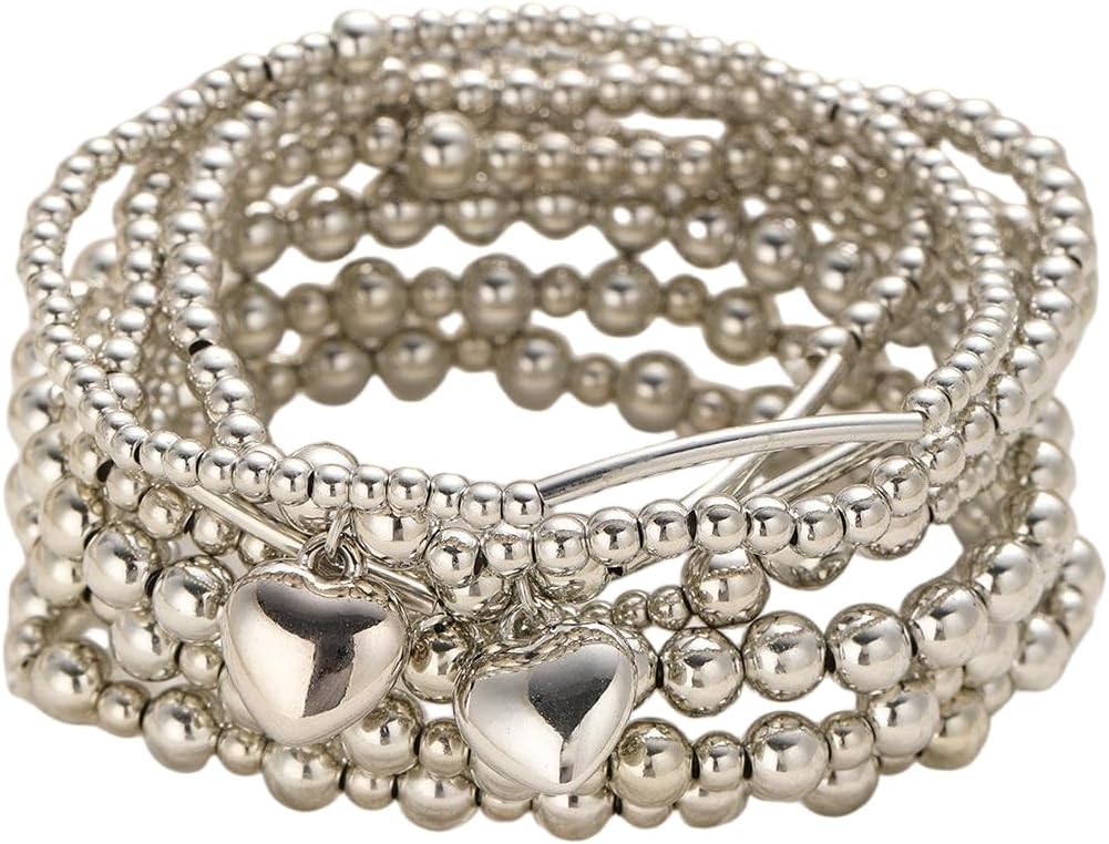 Kysin Chiys gold plated bracelet set arranged side by side.