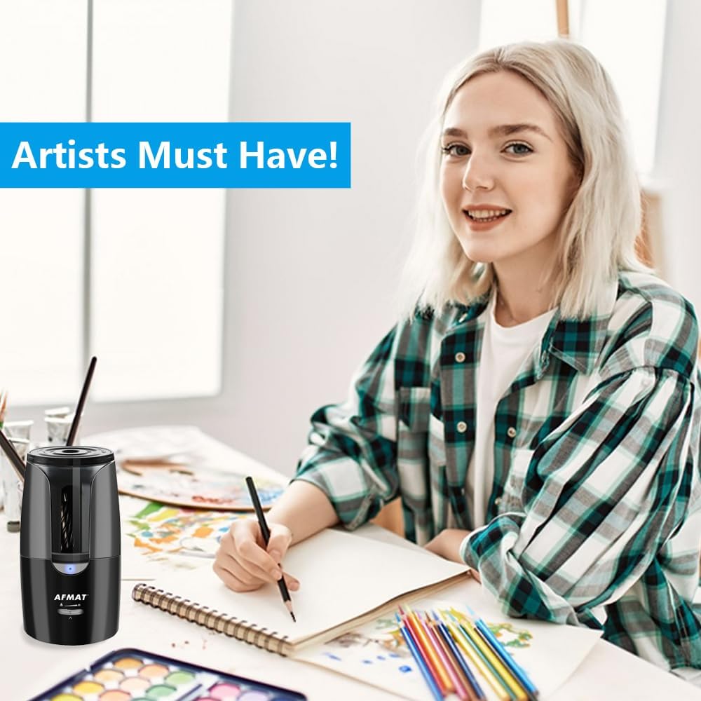 AFMAT portable drawing pencil sharpener in an art studio setup