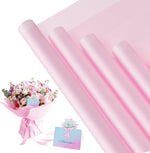 REAXYZNN waterproof flower wrapping paper front view showcasing frosted pink sheets with gold borders.