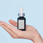 Fresh Mini Vitamin Nectar Glow Juice face serum bottle showing micro-bubble texture close up