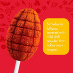 Detailed view of the chili powder coating on a strawberry lollipop