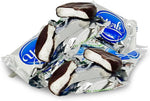 Individually wrapped bulk peppermint patties showing the blue and silver foil wrappers