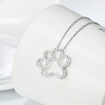 ONEFINITY 925 sterling silver paw necklace displayed inside its exquisite gift box