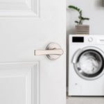 Kwikset satin nickel lever handle side angle