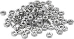 Miniature hardware components arranged on a flat surface