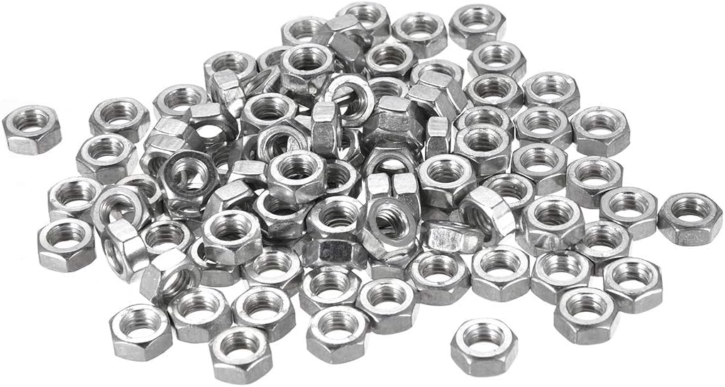 Miniature hardware components arranged on a flat surface
