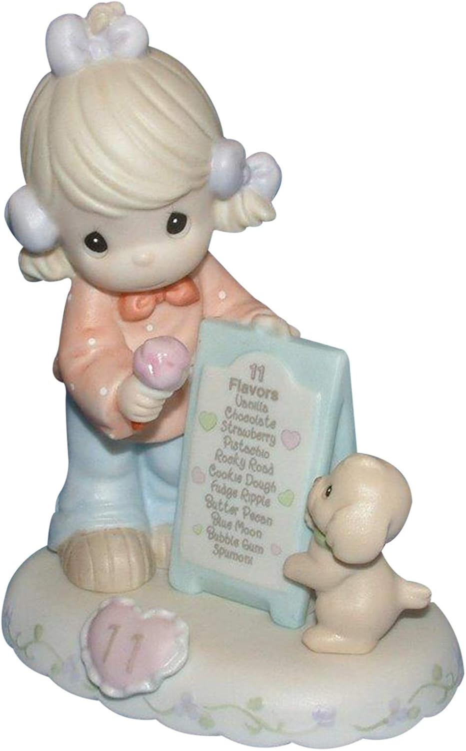 Precious Moments collectible figurine packaging and base branding view