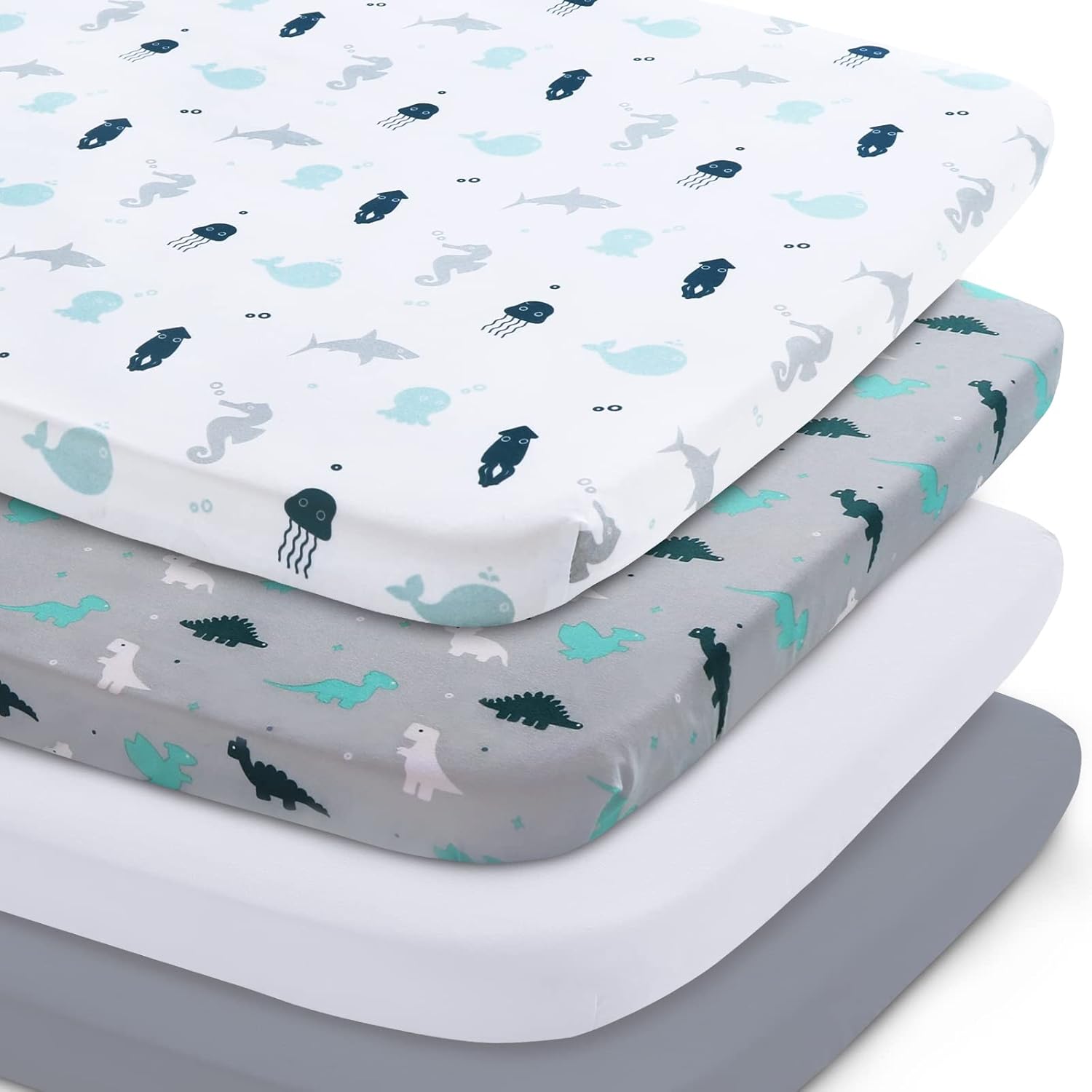 Springspirit bassinet sheet 4 pack in grey shown on baby mattress.