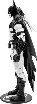 Bandai DC Multiverse Batman figure posing with swords and accessories