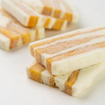 Texture details of the chewy dried fruit cake layer in a GELUBOO slice.