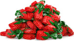 Strawberry flavored bon bons on a serving plate