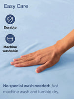 Folded light blue Cal King luxury single fitted sheet stack