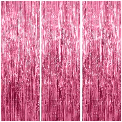Shimmering metallic pink streamers background setup with balloons and party props