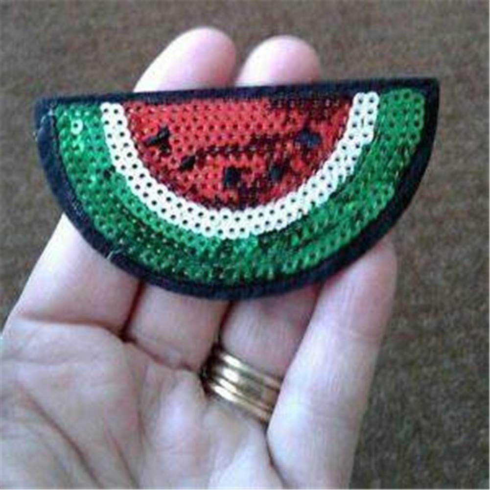 Close up of red and green sequin embroidery on watermelon patches