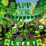 Close up view of the green and gold metallic hanging foil swirls with double sided leprechaun hat and lucky coin cutouts.