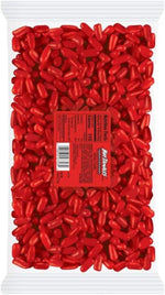 A handful of authentic red hot tamales fierce cinnamon candies