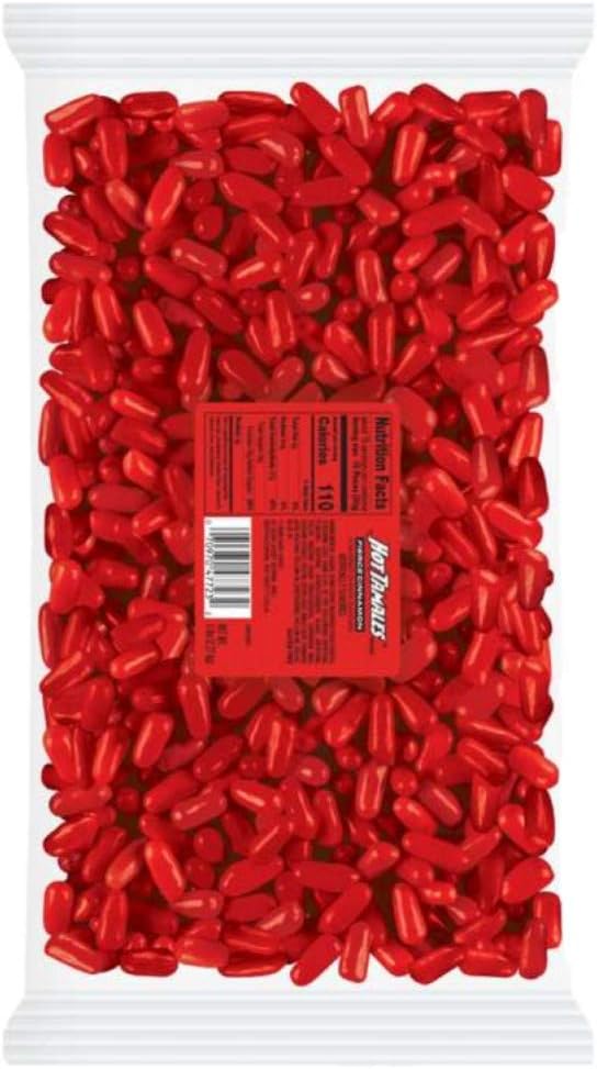 A handful of authentic red hot tamales fierce cinnamon candies
