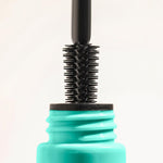Comparison of lashes before and after Milani tubing mascara