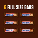 Snickers peanut caramel nougat chocolate bar unwrapped texture close up