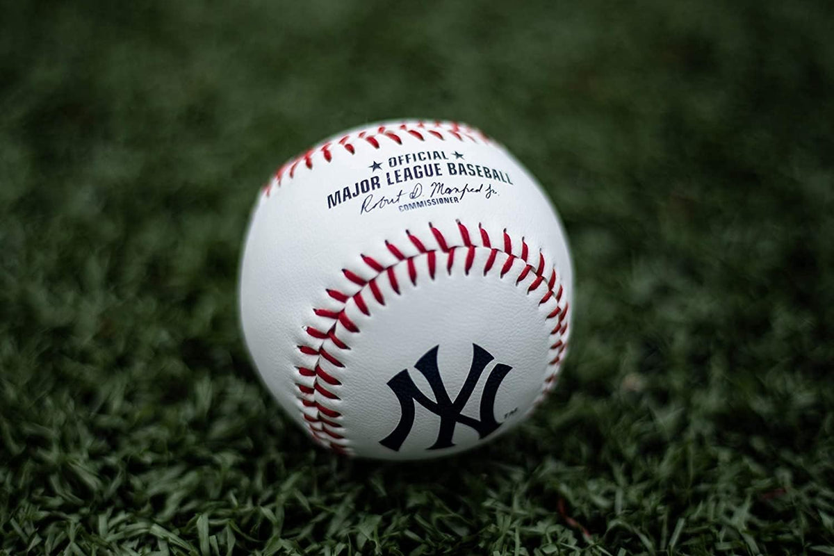 Close up view of baseball seams and composite leather texture