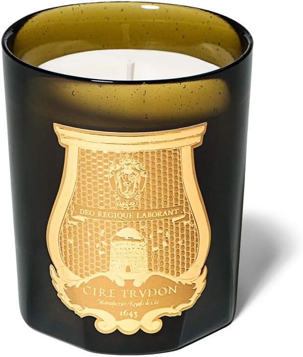 Cire Trudon scented candle displayed on a modern interior table