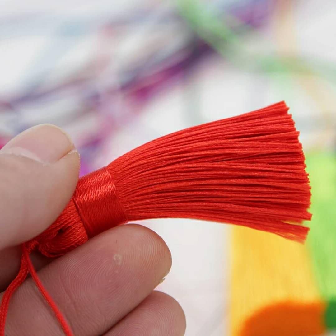 Close up of silky rayon floss texture on Makhry decorative tassels