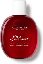 Clarins Eau Dynamisante skincare and body spray bottle close up view