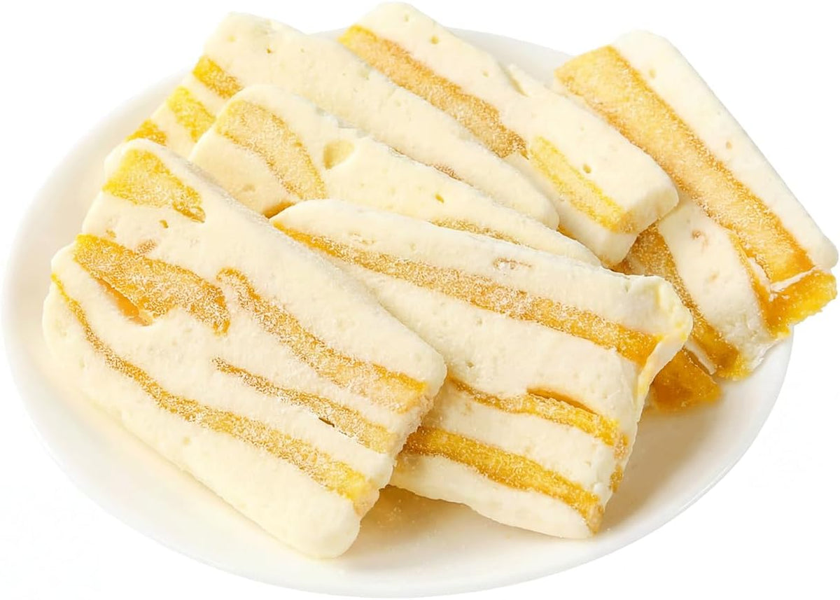 A single piece of GELUBOO mango nougat being served with afternoon tea.