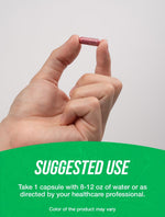 Close up of vegan cranberry extract capsules on white background