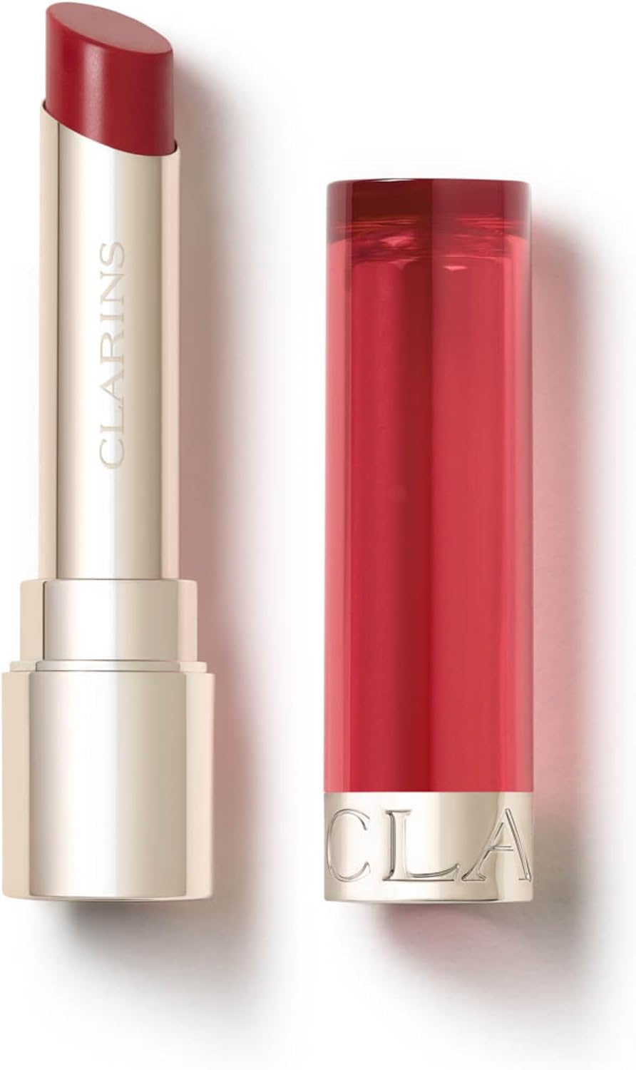 Clarins lip oil balm front view with signature translucent pink cap and embossed silver lettering.