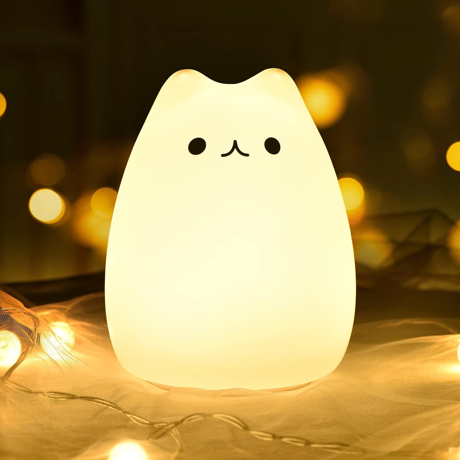 GoLine cute kitty silicone night light front view displaying the adorable sleeping cat face design.