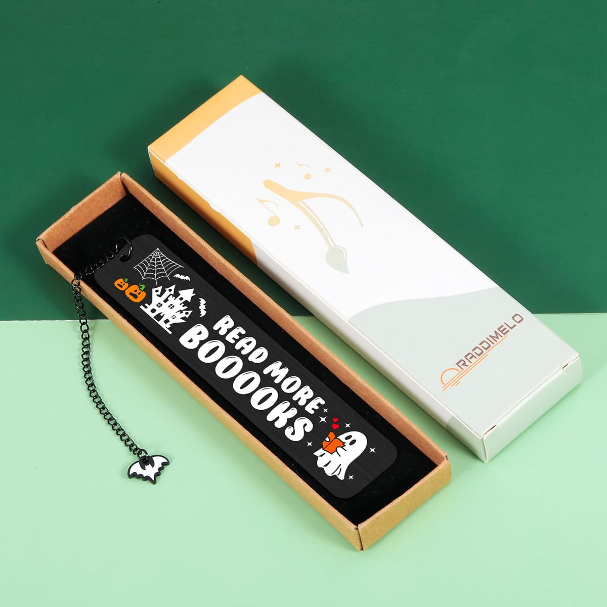 Lifestyle flatlay of the dark romance bookmark with bookish decor
