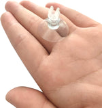 Pack of twenty four transparent AQUANEAT suction clamps for organizing fish tank accessories.