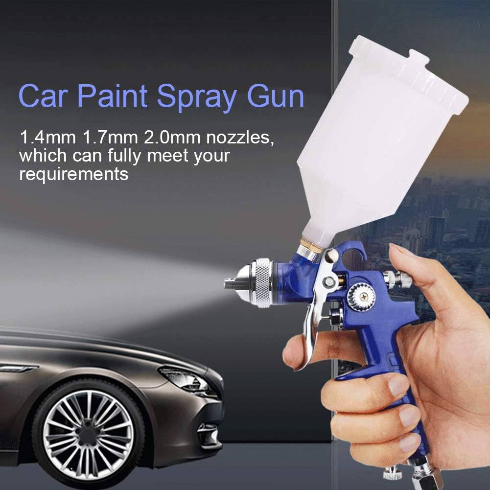 Included cleaning tools and accessories laid out alongside the spray gun kit