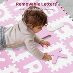 Top down view of pink and white Honey Joy interlocking puzzle pieces