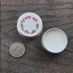 Wuiil cosmetic storage tins packaged in the 12 pack bundle.