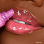 Swatches of the moisturizing sheer pink tint from the Milani lip treatment balm.