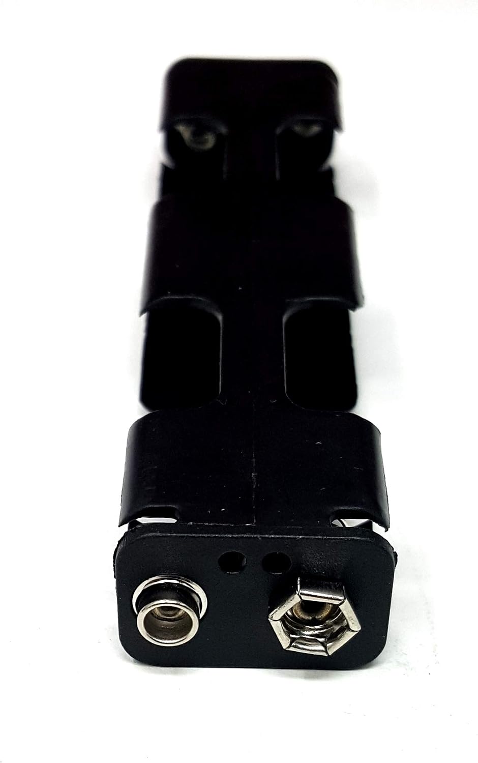Corpco battery holder showing snap connector and spring contacts
