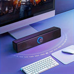 Rear view of the ZYQHMY multimedia speaker highlighting the integrated auxiliary and USB connection cables