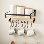 Three assorted sizes of ceramic coffee and sugar canisters