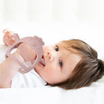 PandaEar baby teether mitten in white and pink
