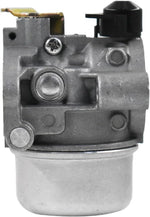 Included mounting gaskets paired alongside the carburetor assembly.