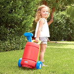 Little Tikes golf set components including clubs and practice hole