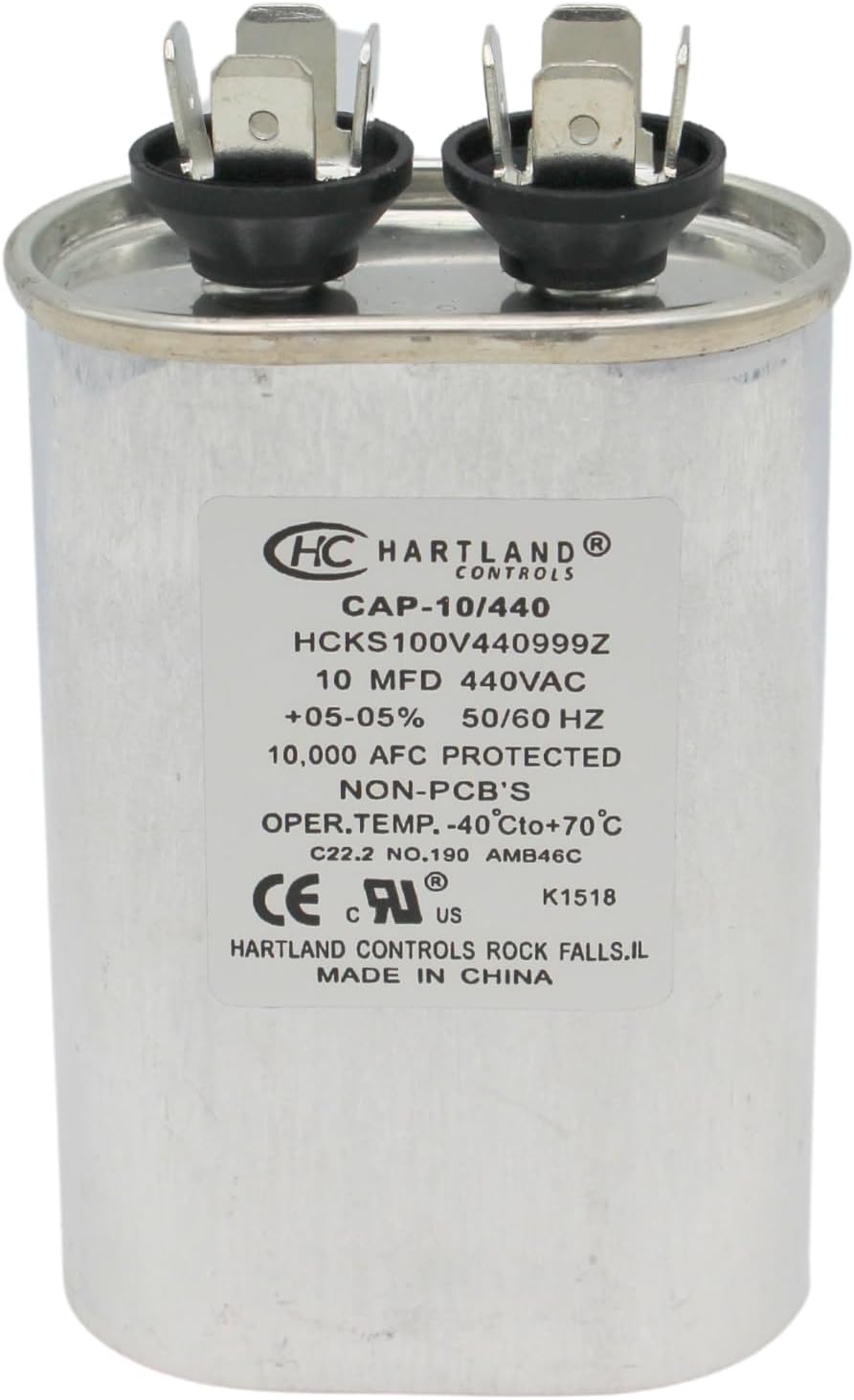 The HVAC Genius AC capacitor installed in an HVAC unit compressor setup