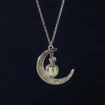 EEQQBZ celestial pendant jewelry flat lay view