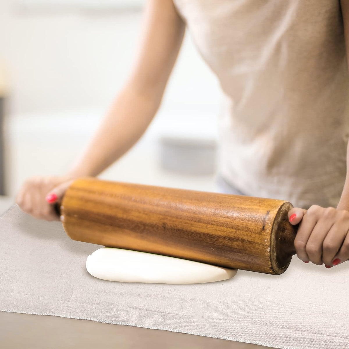 Freshly baked artisan bread resting on linen couche
